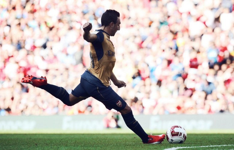 Cazorla fizzes his shot under the wall