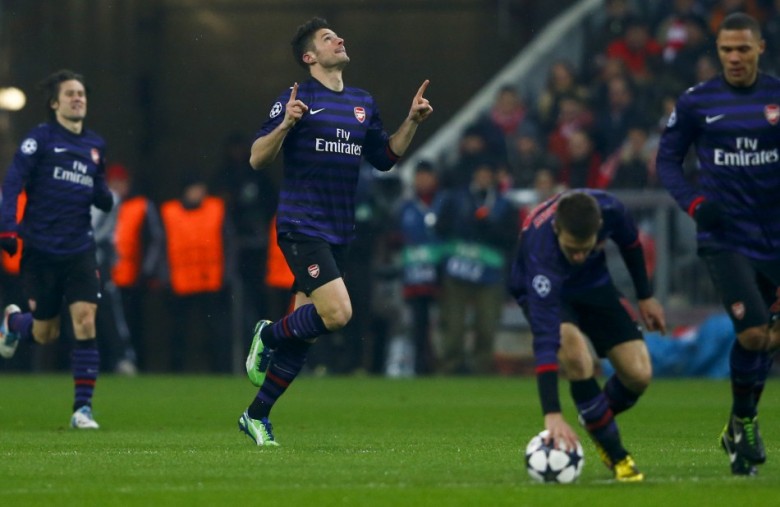 Giroud celebrates opening the scoring against Bayern Munich