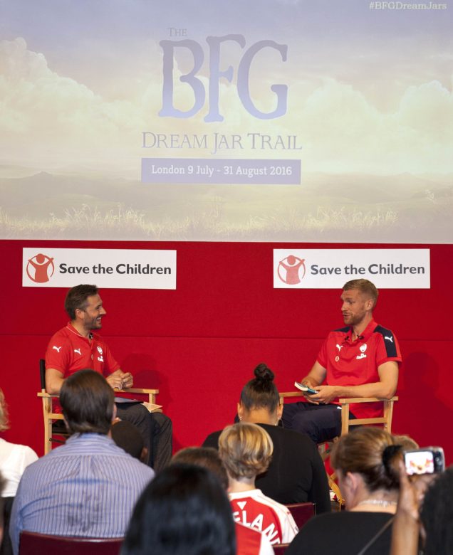 On Tuesday 12 th July Arsenal held a Junior Gunners event at the Emirates Stadium.. as partners with Save the Children, the Arsenal and the BFG Dream Jar Trail launch event. The event was hosted by Nigel Mitchell – Arsenal’s official pitch side presenter fronting The Match Day Show, as well as professional footballer, Per Mertesacker. Per Mertesacker read his favorite section of Roald Dahl's "the BFG" and presented the prize to 10 year old Fahad. The BFG Dream Jar Trail brings to life the long-held dreams of celebrities and artists with Dream Jars across London and beyond this summer. Each jar contains “splendiferous” sculptures based on dream stories from the likes of Steven Spielberg, Stephen Hawking, the Delevingne sisters and many more. The Dream Jars will be located in iconic spots such as Tower Bridge, Trafalgar Square and Buckingham Palace. 32 Dream Jars will be available to view from from 9 July and a further 18 Dream Jars will be available by 22 July, in time for the release of The BFG in UK cinemas. The jars will be sold to raise money for Save The Children and Roald Dahl’s Marvellous Children’s Charity. One of these dream Jars is located at The Emirates stadium and this event on 12 th July marks its launch. © photograph by David Sandison www.dsandison.com +44 7710 576 445 +44 208 979 6745