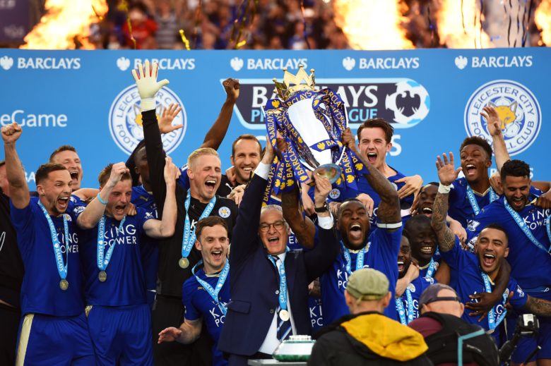 LEICESTER, ENGLAND - MAY 07: Captain Wes Morgan and manager Claudio Ranieri of Leicester City lift the Premier League Trophy after the Barclays Premier League match between Leicester City and Everton at The King Power Stadium on May 7, 2016 in Leicester, United Kingdom. (Photo by Laurence Griffiths/Getty Images)