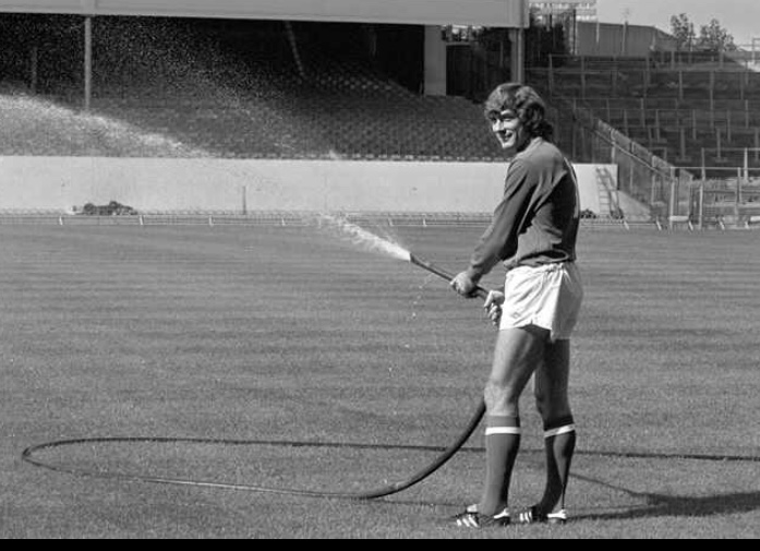 Pat helping out by watering the Highbury pitch