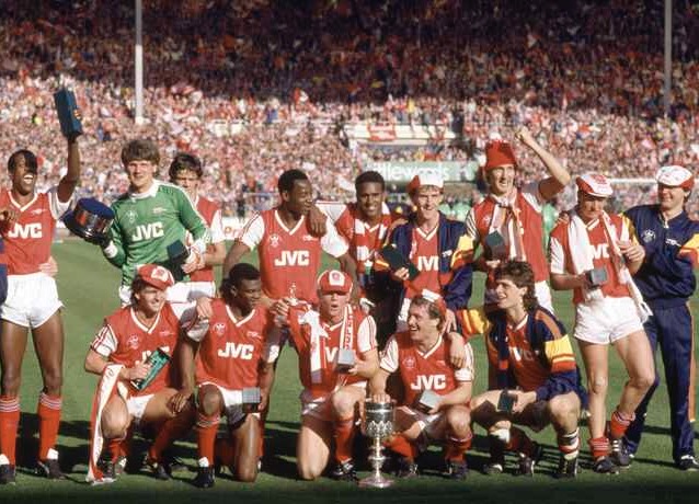 Rocky and his team mates celebrate winning the Littlewoods Cup