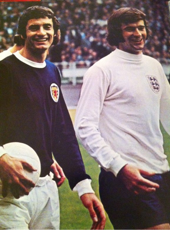 Club team mates Frank McLintock and Peter Storey are foes for England v Scotland