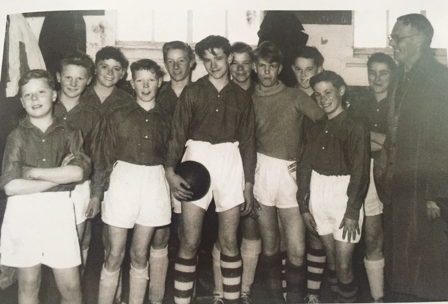 A young Peter Storey holding the ball, as captain of Aldershot and Farnborough Schools Under-13's