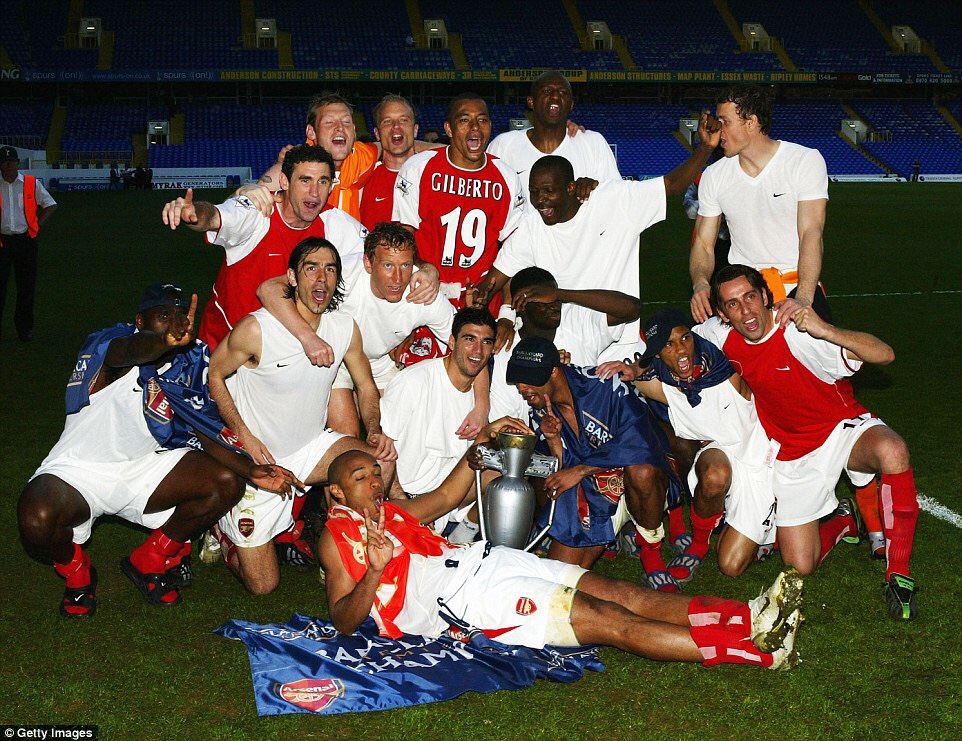 Robert celebrates with the rest of the Arsenal players