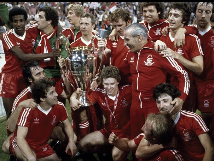 Woodcock celebrates winning the European Cup with his team mates