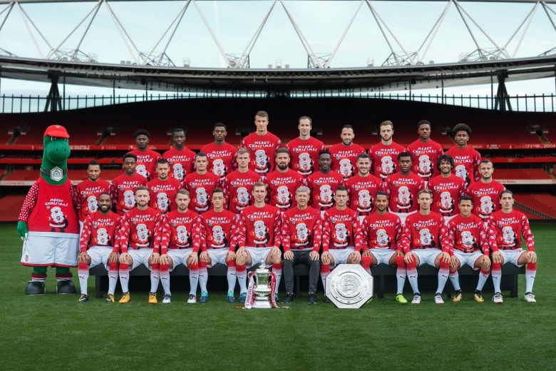 Arsenal Christmas Jumper team photo. (Credit: Arsenal Media)